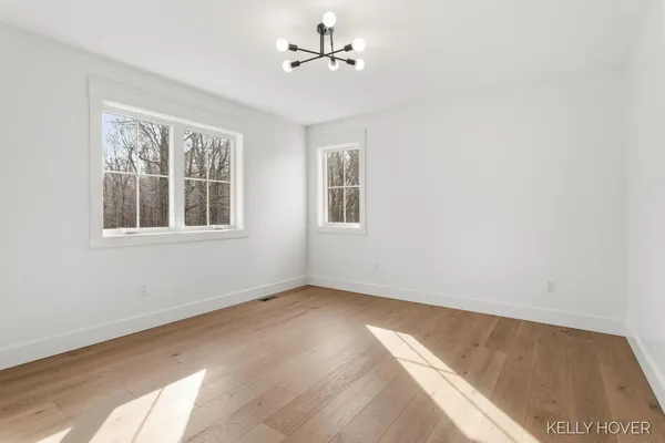 $2,100,000 | 402 Ottogan Hls Court, Byron Center, MI 49315