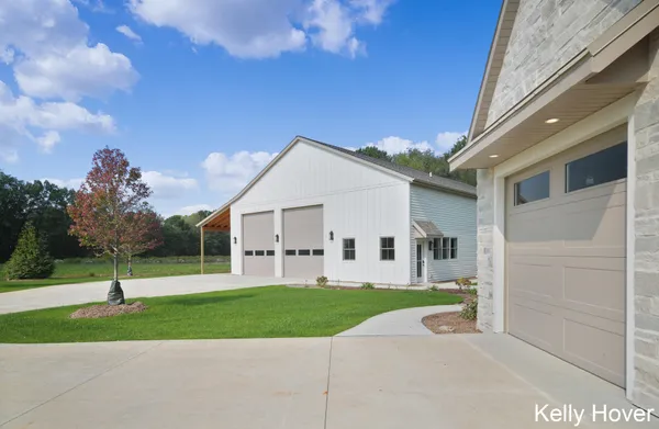 $2,100,000 | 402 Ottogan Hls Court, Byron Center, MI 49315