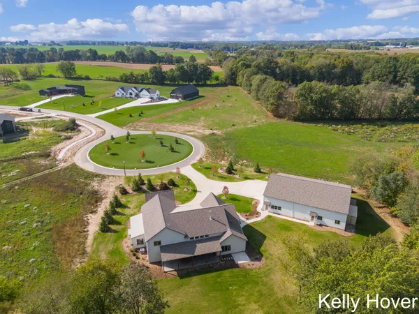 $2,100,000 | 402 Ottogan Hls Court, Byron Center, MI 49315