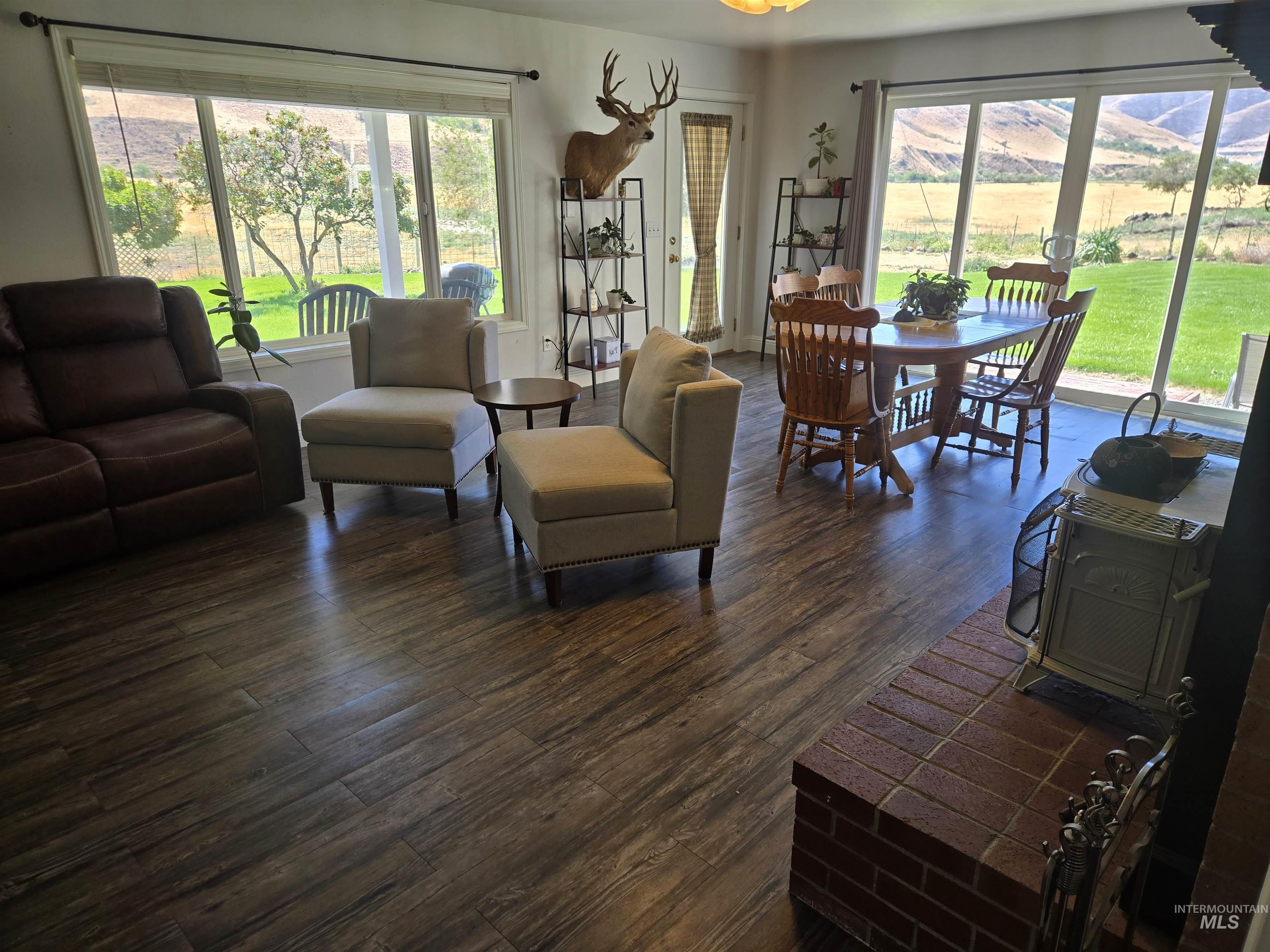 17082 Snake River Road Asotin, WA 99402 - Photo 29 of 31 Living area with dark wood-style flooring