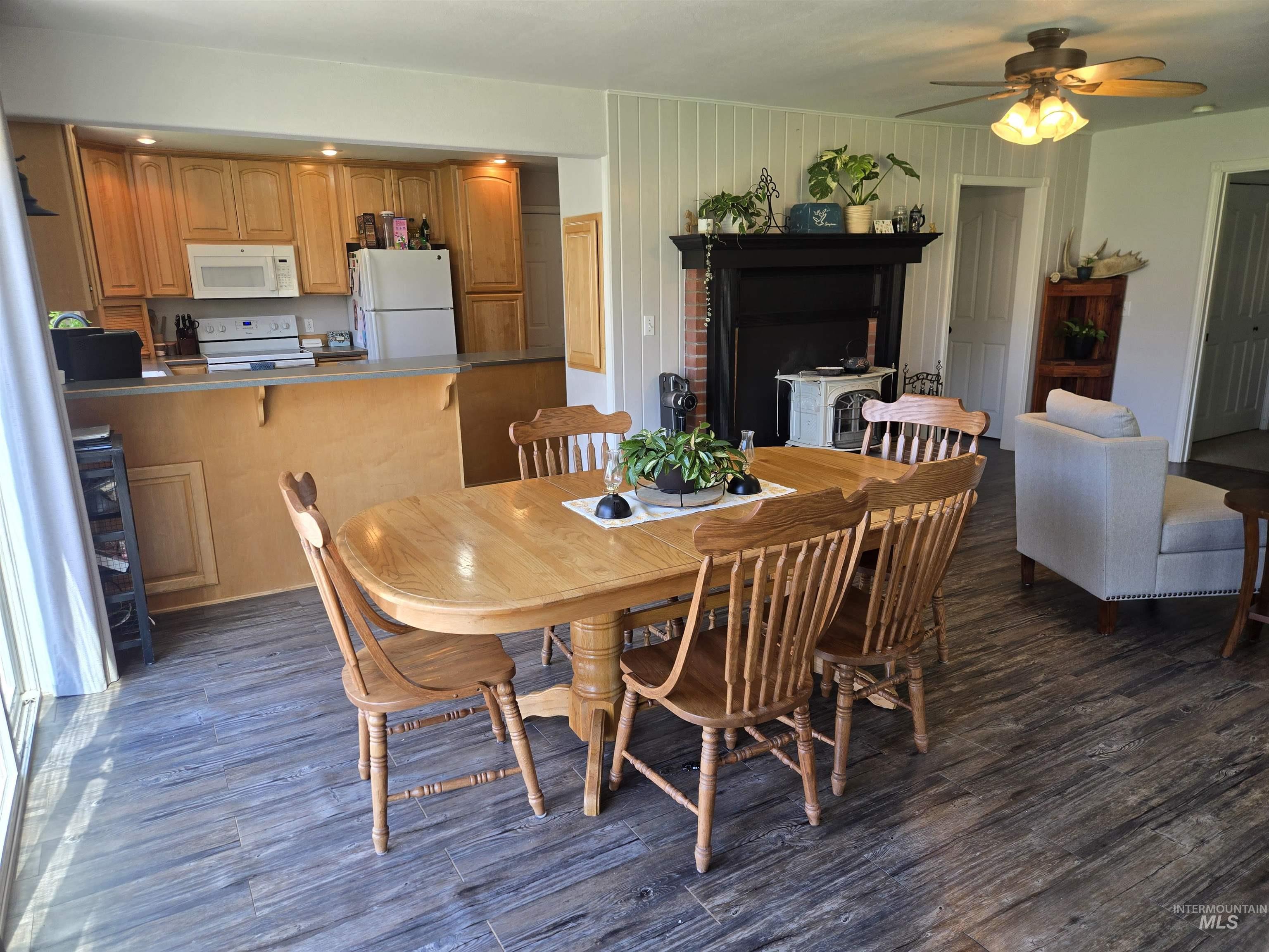 17082 Snake River Road Asotin, WA 99402 - Photo 4 of 31 Dining area featuring dark wood-type flooring and a ceiling fan