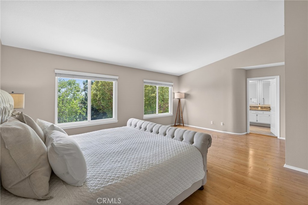 19468 Kilfinan Street Porter Ranch, CA 91326 - Photo 27 of 48 a bed sitting in a bedroom next to a window