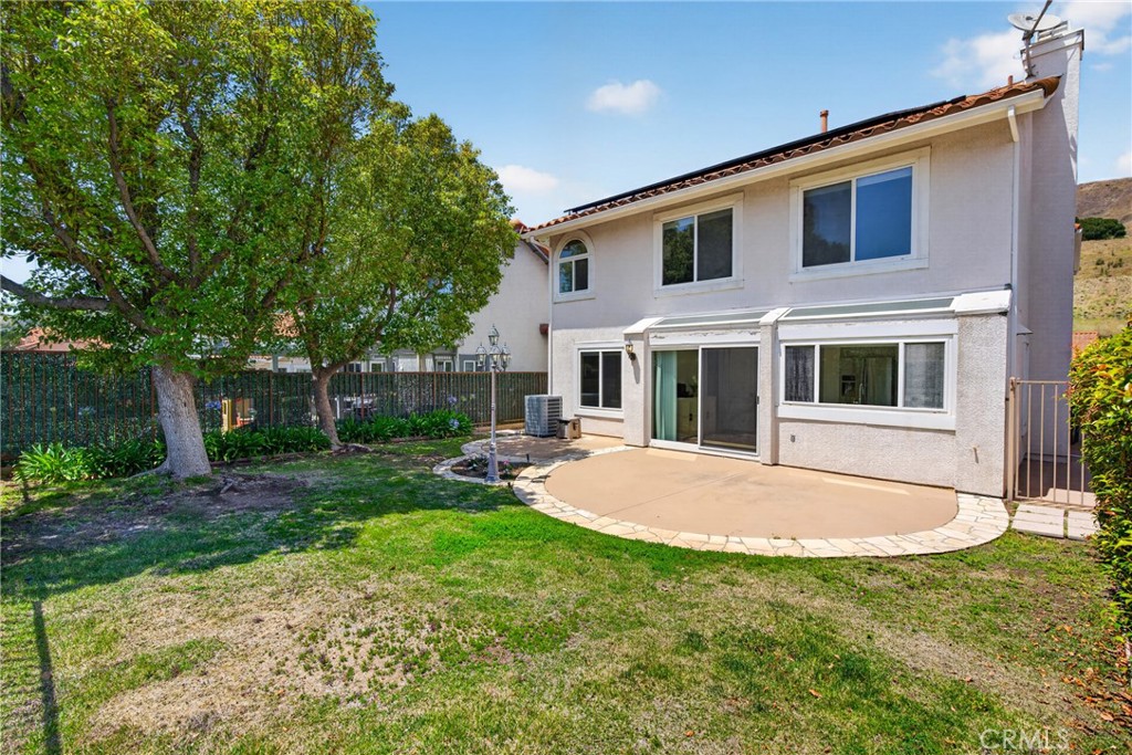 19468 Kilfinan Street Porter Ranch, CA 91326 - Photo 43 of 48 a view of a house with backyard and sitting area