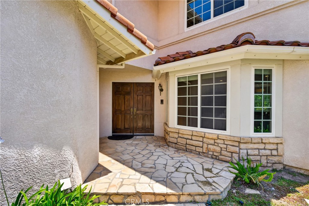 19468 Kilfinan Street Porter Ranch, CA 91326 - Photo 46 of 48 a front view of a house with a large window