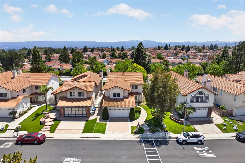 19468 Kilfinan Street Porter Ranch, CA 91326 - Photo 47 of 48 an aerial view of multiple houses with a street