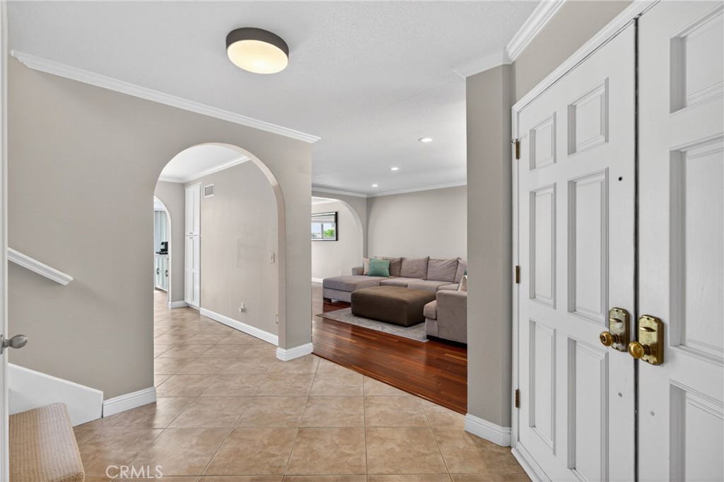 19468 Kilfinan Street Porter Ranch, CA 91326 - Photo 9 of 48 a living room with furniture and a rug