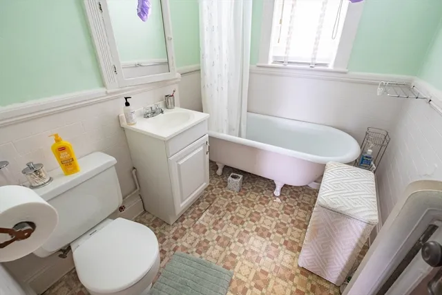 a bathroom with a sink toilet and bathtub