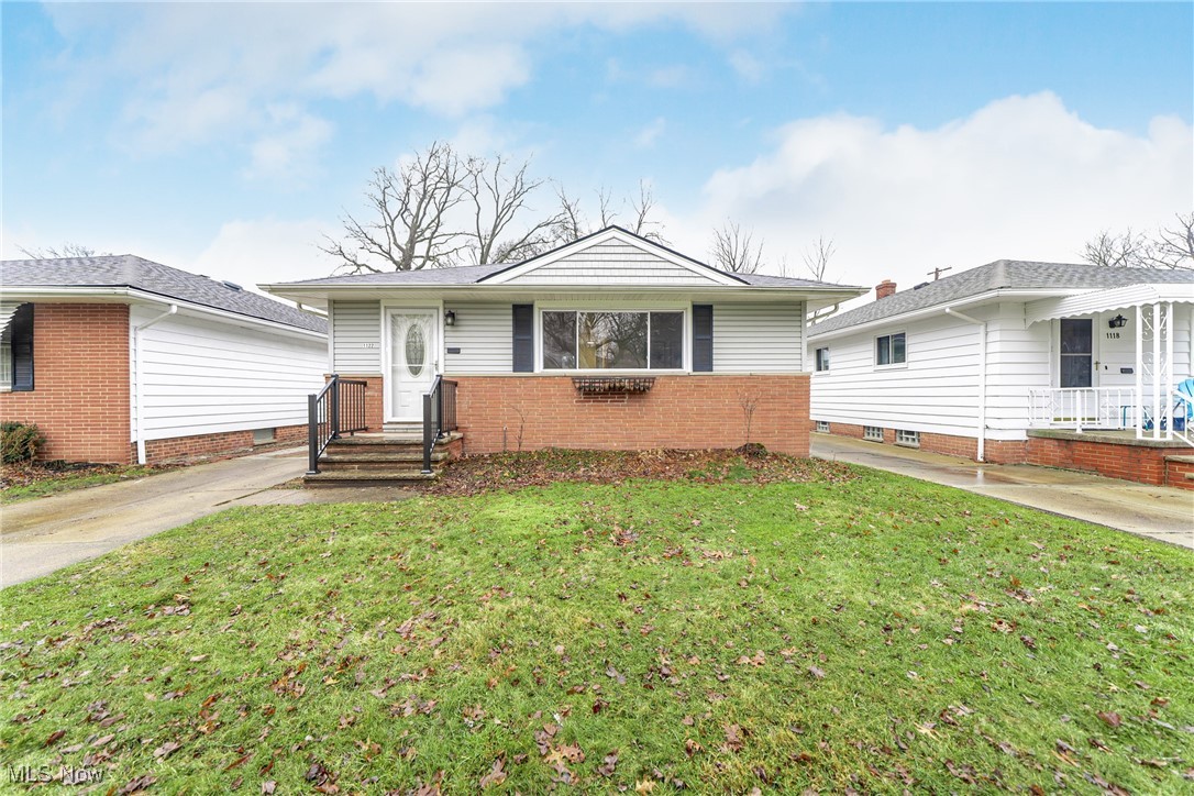 1122 Homestead Road Cleveland, OH 44121 - Photo 1 of 27 View of front facade and front yard