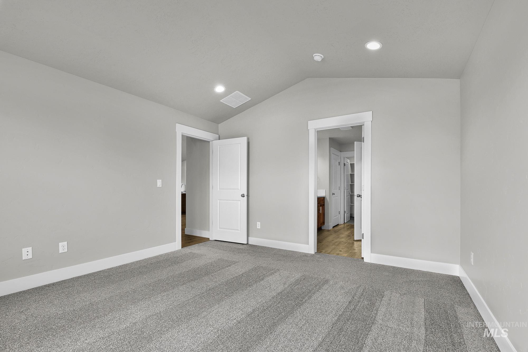 320 North 12th Parma, ID 83660 - Photo 23 of 34 Room featuring gray patterned carpeting, light gray wall paint, and white baseboards
