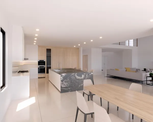 a living room with furniture and kitchen view