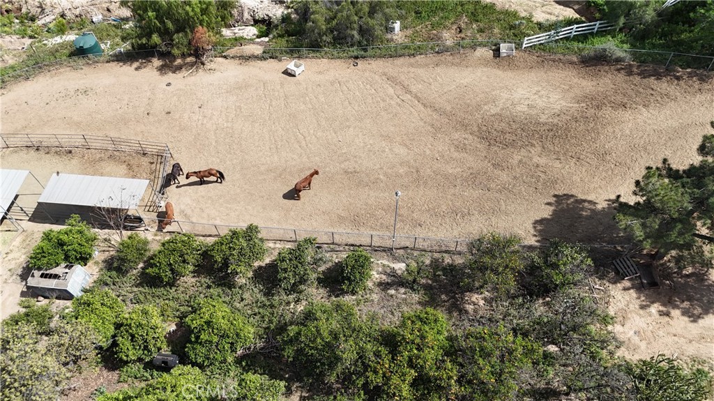 17575 Wicker Way Riverside, CA 92504 - Photo 11 of 44 an aerial view of a house with a yard and large trees