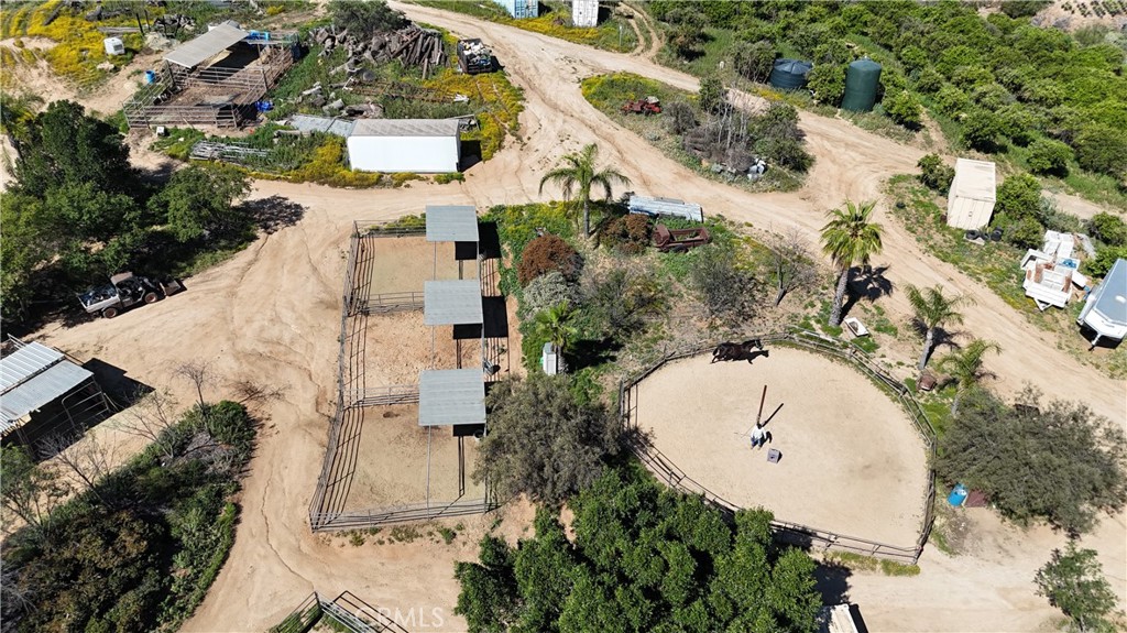 17575 Wicker Way Riverside, CA 92504 - Photo 17 of 44 an aerial view of a house with a yard and lake view