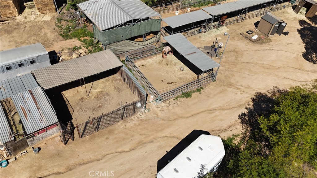 17575 Wicker Way Riverside, CA 92504 - Photo 19 of 44 an aerial view of a house with roof and wooden floor