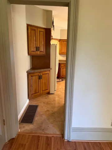 a kitchen with stainless steel appliances granite countertop a stove and a refrigerator