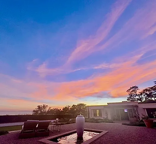 a view of a city street with sunset view