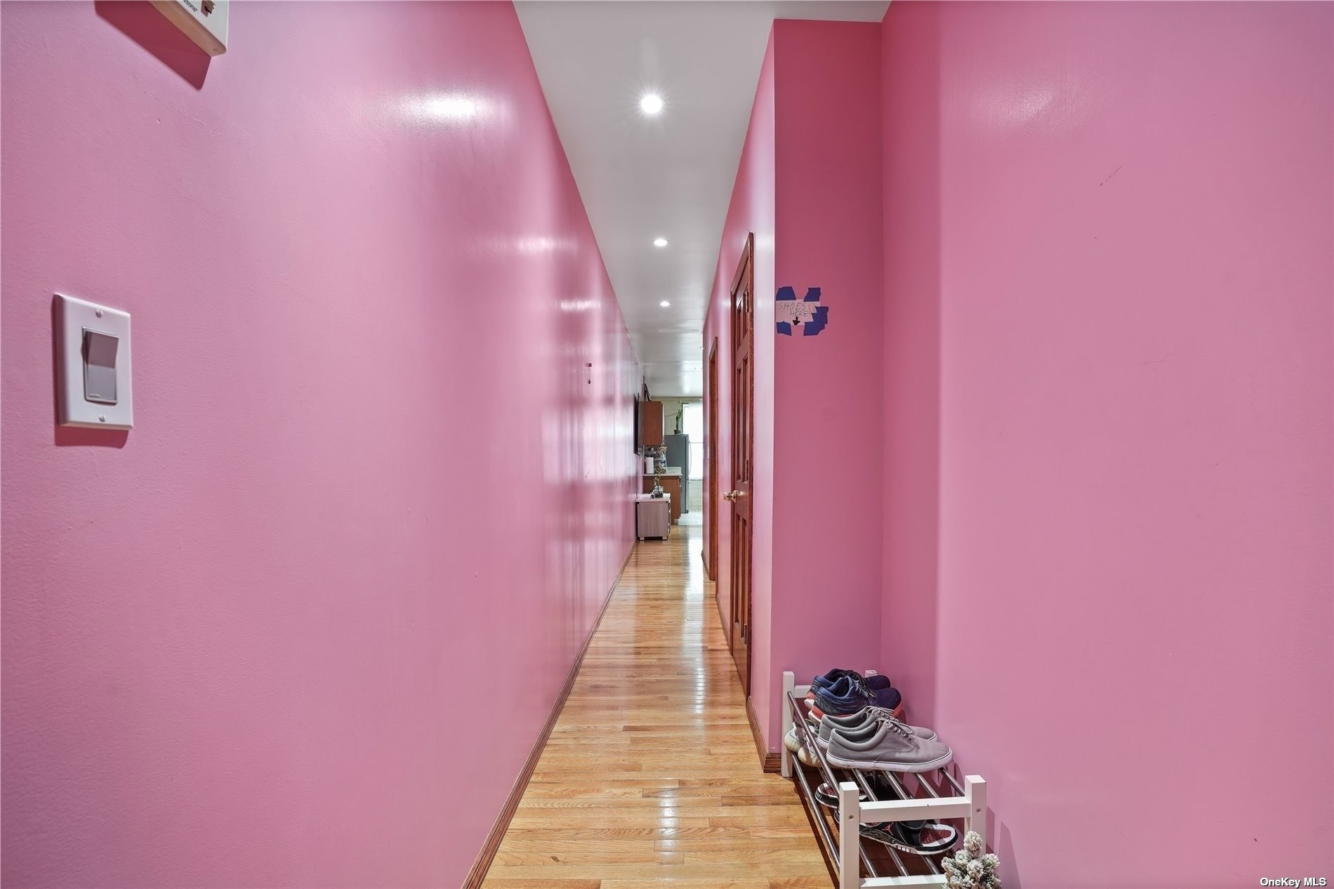 18-11 Centre Street Queens, NY 11385 - Photo 11 of 27 a view of a hallway with wooden floor