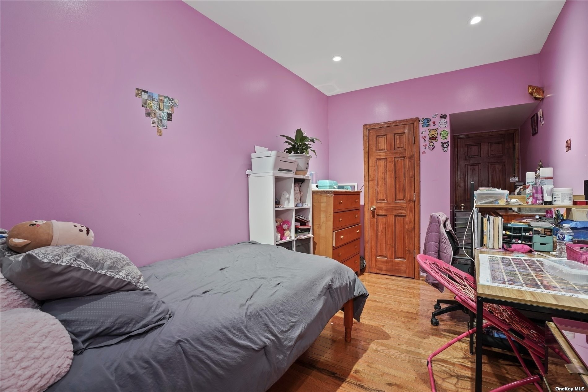 18-11 Centre Street Queens, NY 11385 - Photo 13 of 27 a bedroom with a bed and a desk