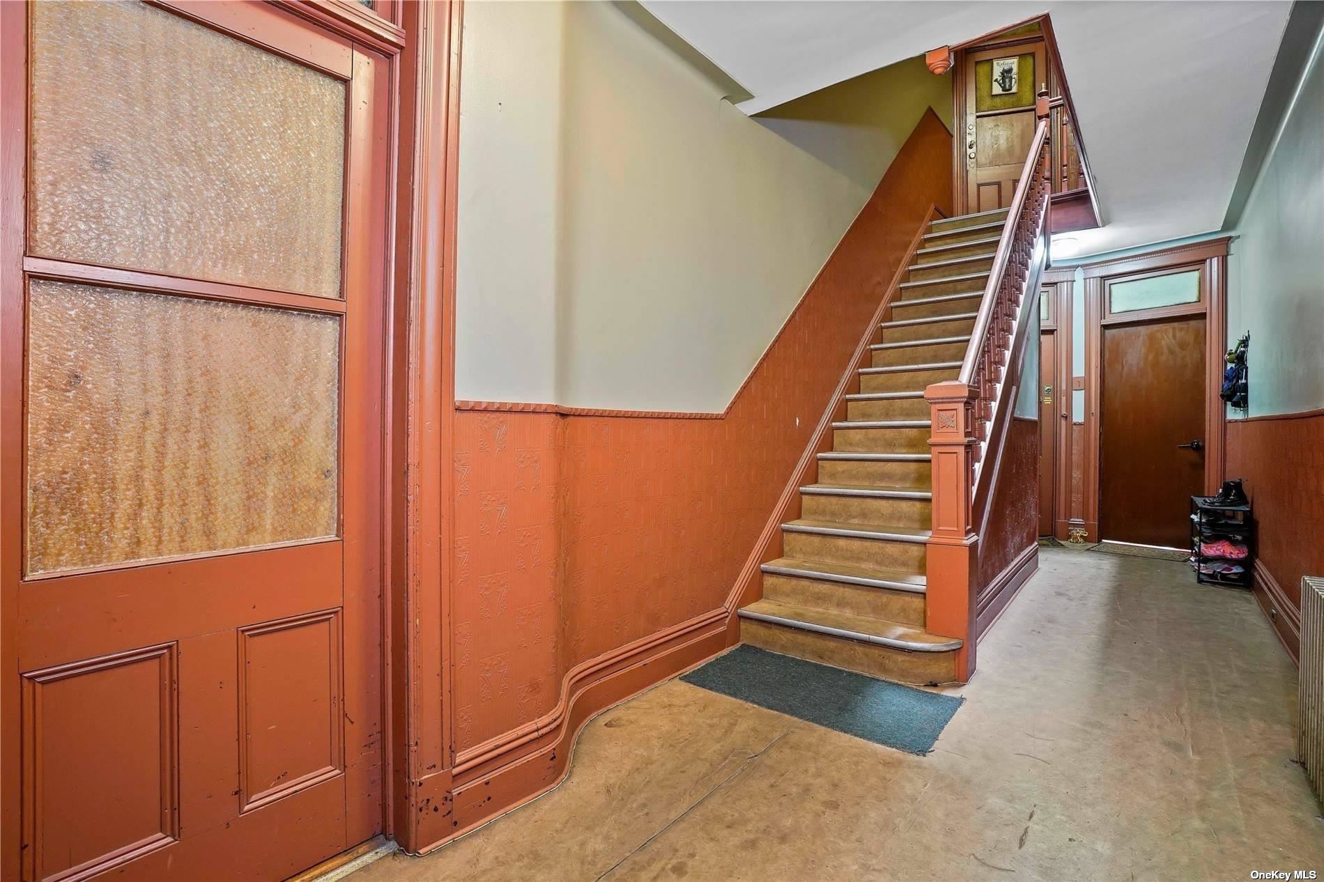 18-11 Centre Street Queens, NY 11385 - Photo 17 of 27 a view of a staircase with wooden floor and stairs