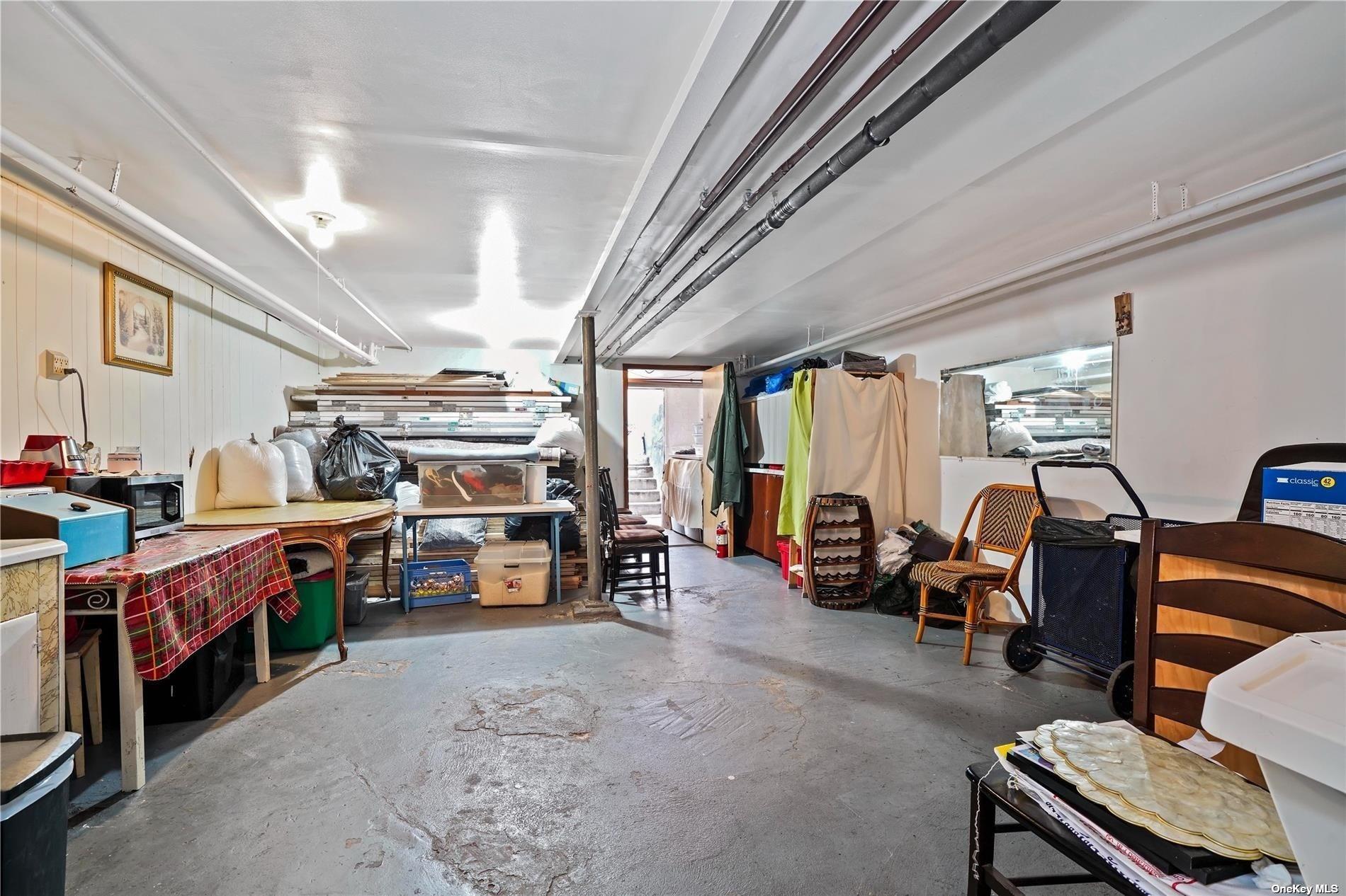 18-11 Centre Street Queens, NY 11385 - Photo 21 of 27 a view of a room with lots of stuff