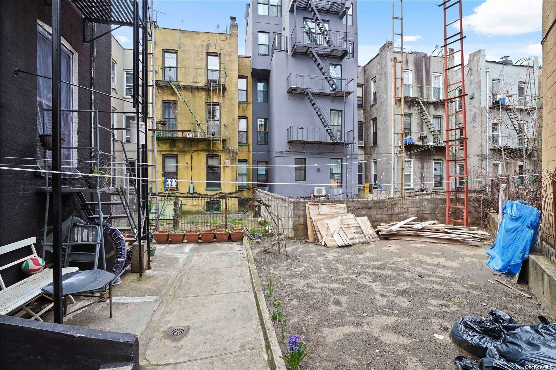 18-11 Centre Street Queens, NY 11385 - Photo 26 of 27 a view of a city with tall buildings