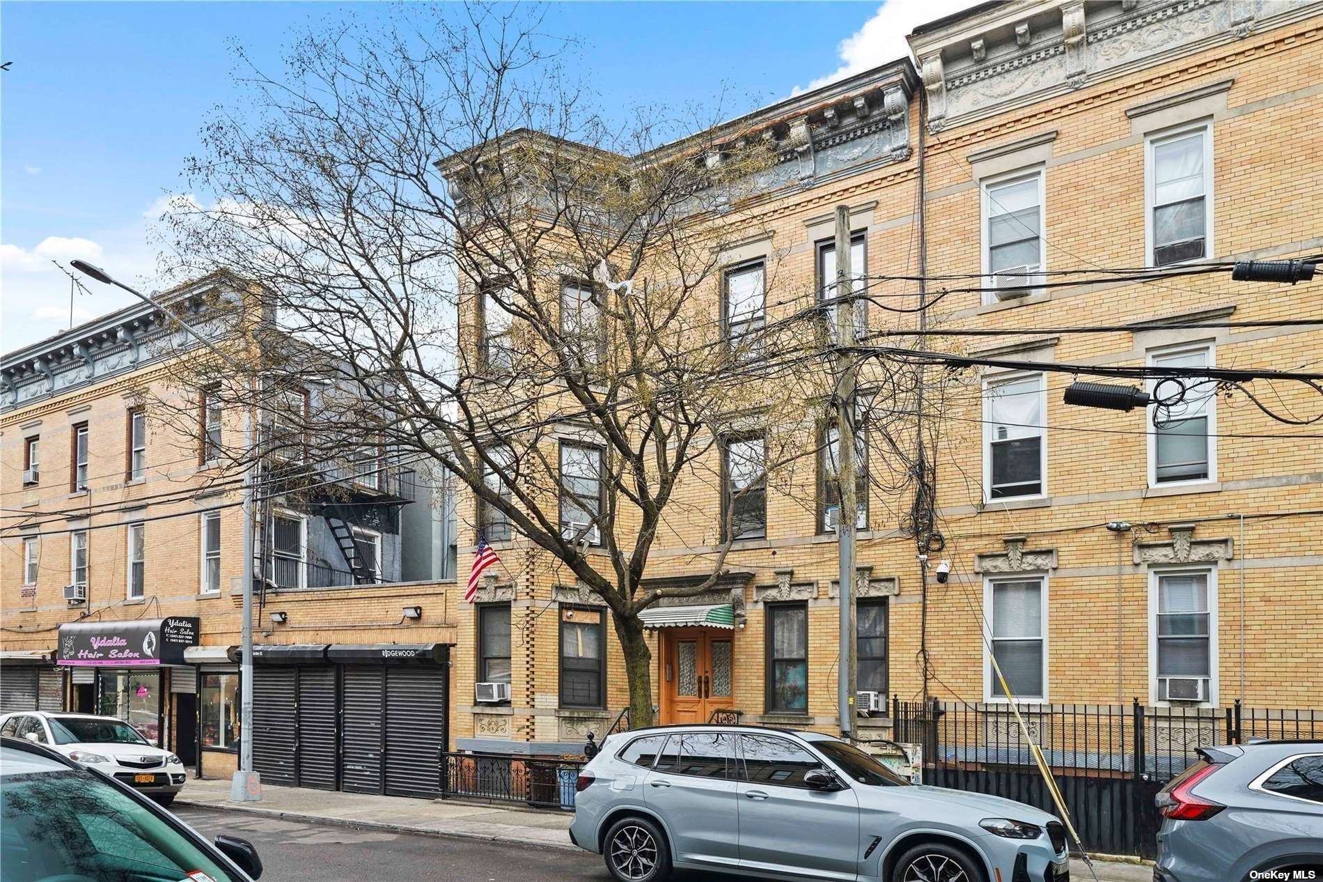 18-11 Centre Street Queens, NY 11385 - Photo 4 of 27 a car parked in front of a building