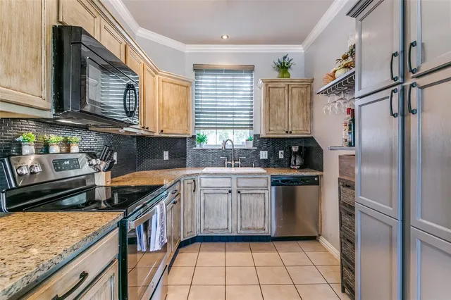 a bathroom with a bathtub sink and window