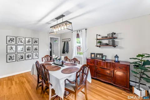 a view of a dining room with furniture