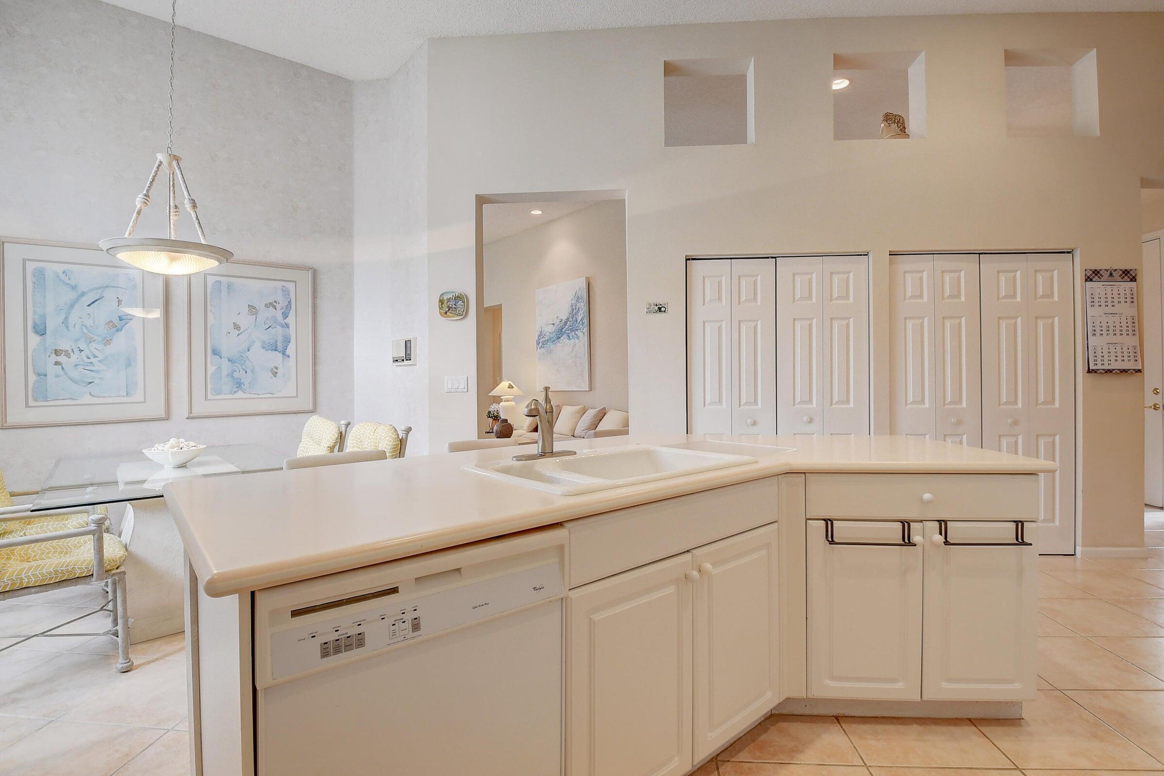 7725 Rockford Road Boynton Beach, FL 33472 - Photo 12 of 47 a bathroom with a sink and a mirror