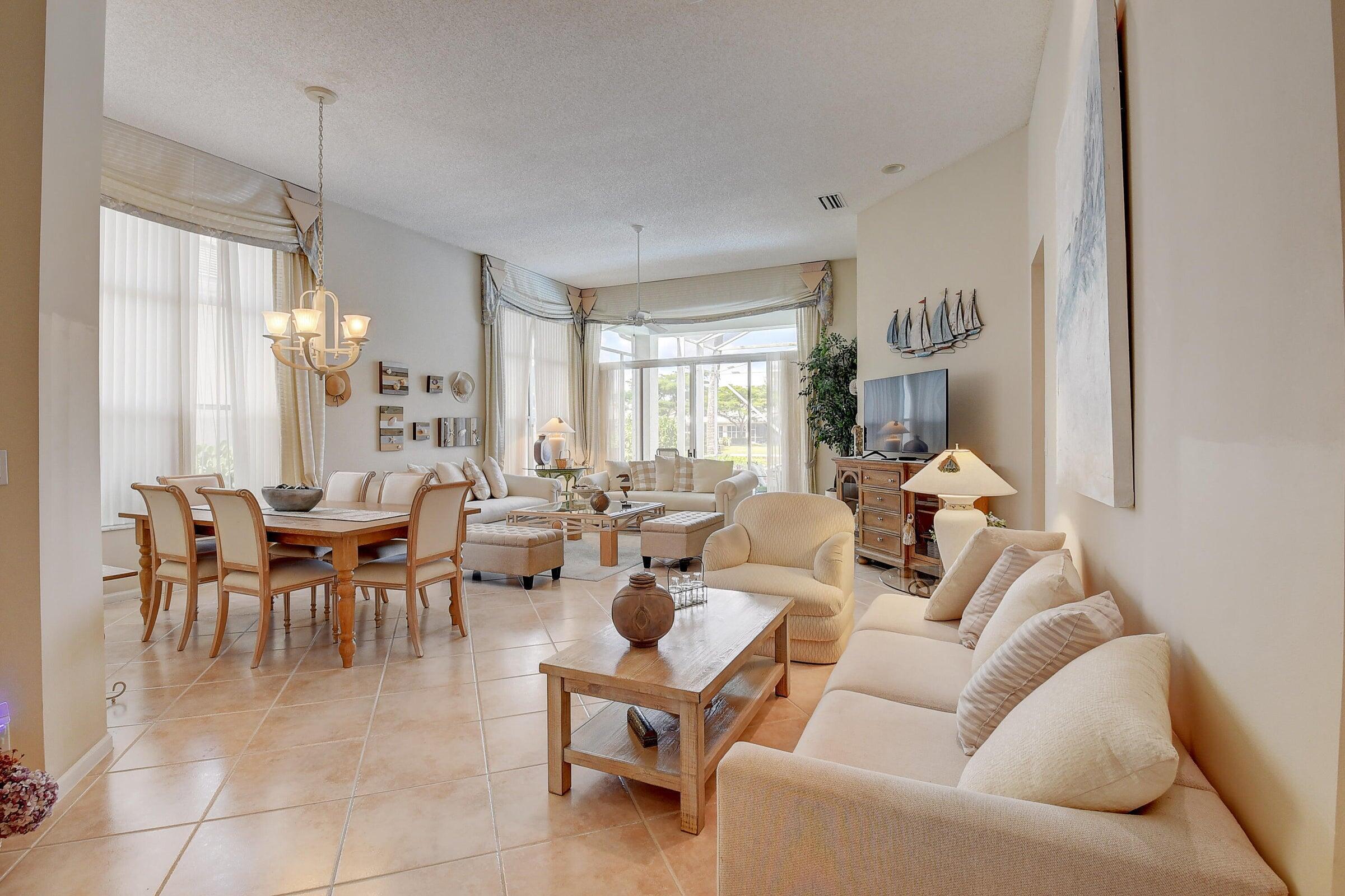 7725 Rockford Road Boynton Beach, FL 33472 - Photo 3 of 47 a living room with furniture and a large window
