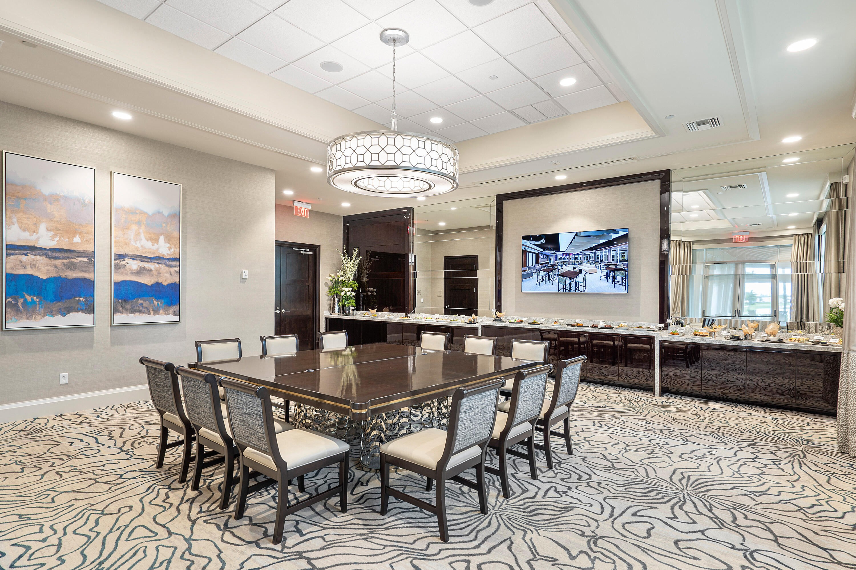 7725 Rockford Road Boynton Beach, FL 33472 - Photo 32 of 47 a view of a dining room with furniture wooden floor and chandelier