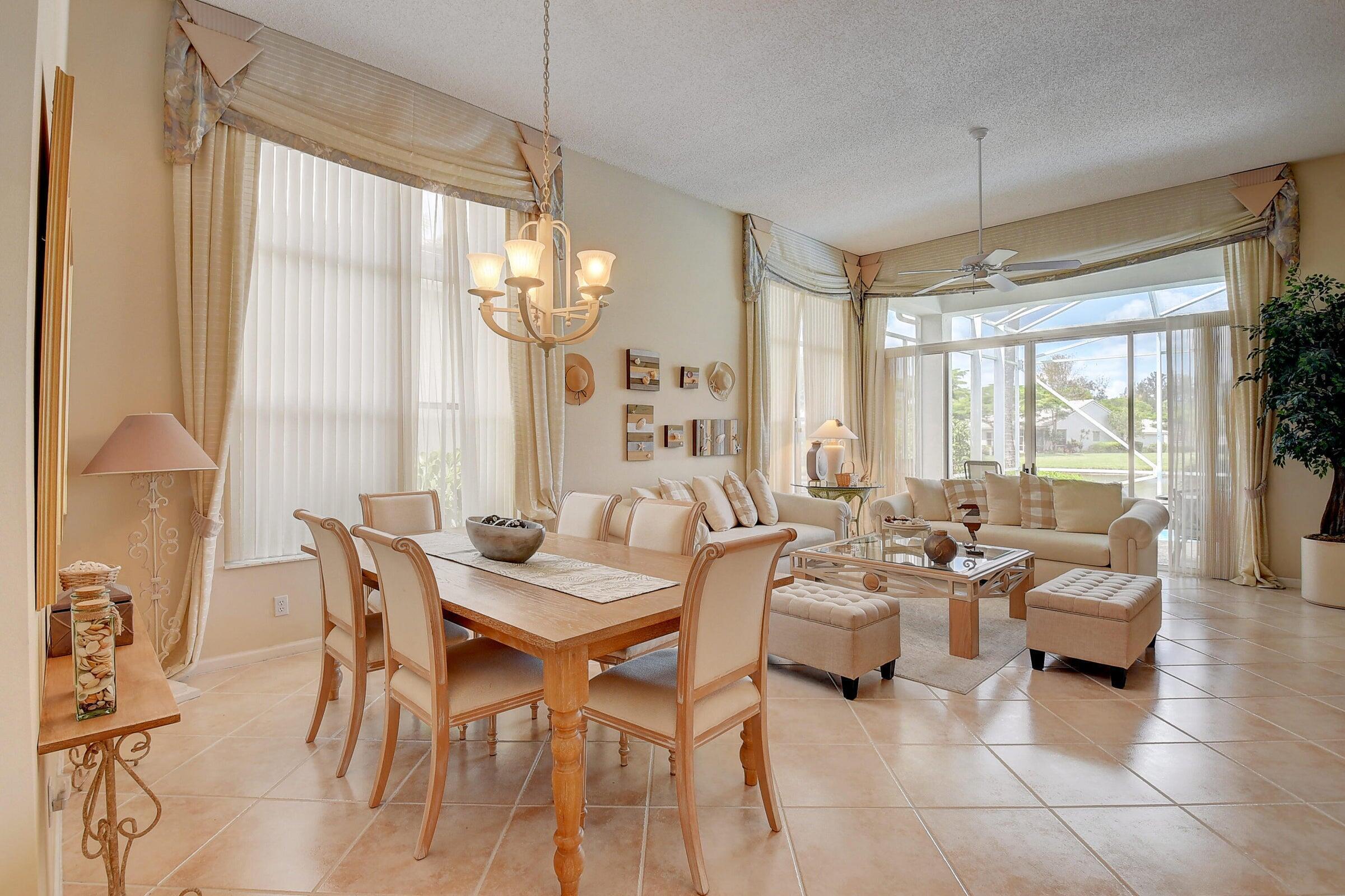7725 Rockford Road Boynton Beach, FL 33472 - Photo 4 of 47 a living room with furniture and a large window