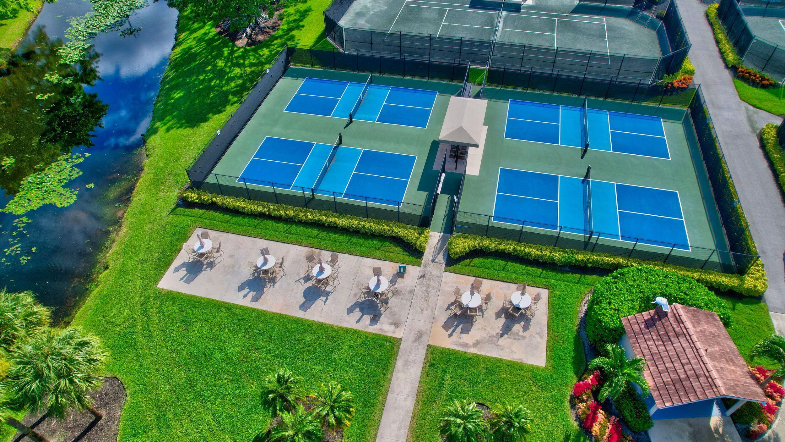 7725 Rockford Road Boynton Beach, FL 33472 - Photo 44 of 47 a backyard of a house with lots of green space