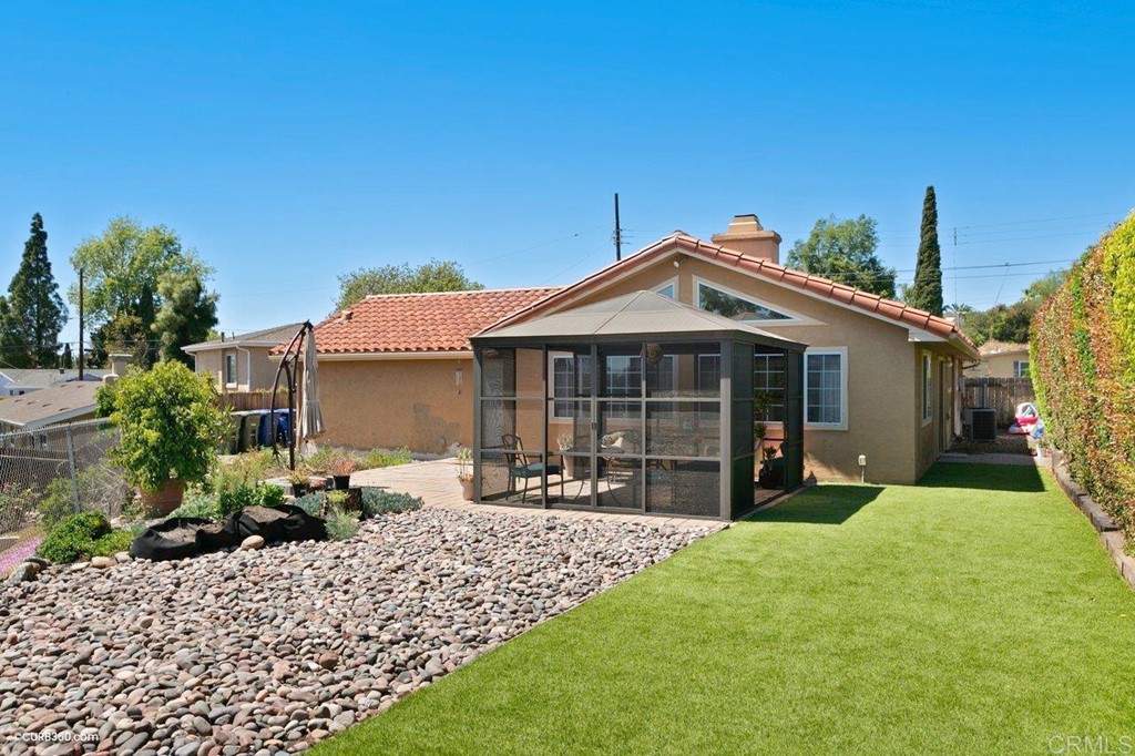 8115 Whitehead Place La Mesa, CA 91942 - Photo 7 of 30 a front view of a house with garden