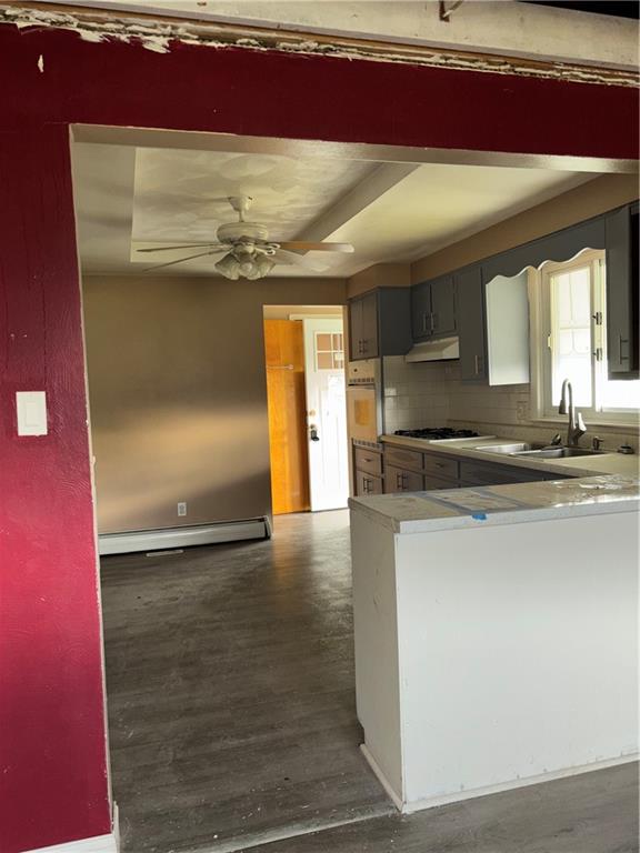 306 West 1st Street Rural Valley, PA 16249 - Photo 3 of 12 a kitchen with granite countertop a sink and a stove
