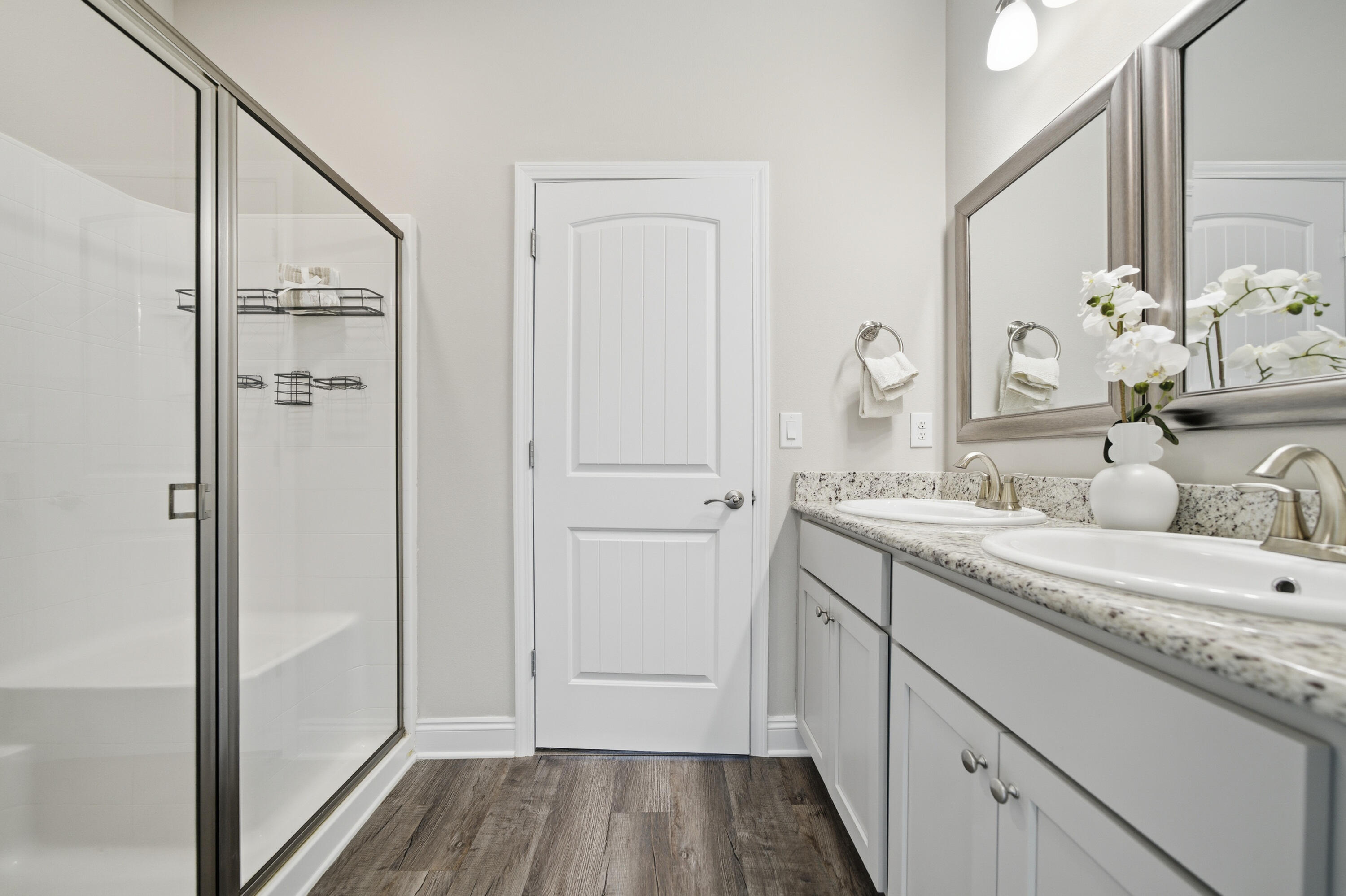 802 Marquis Way Freeport, FL 32439 - Photo 21 of 43 a bathroom with a granite countertop sink and a mirror