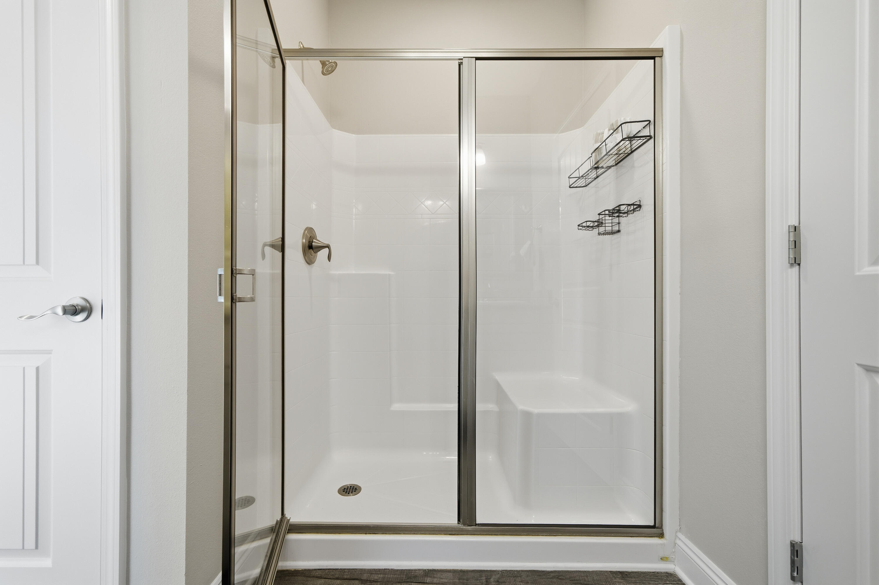 802 Marquis Way Freeport, FL 32439 - Photo 22 of 43 a bathroom with a glass shower door