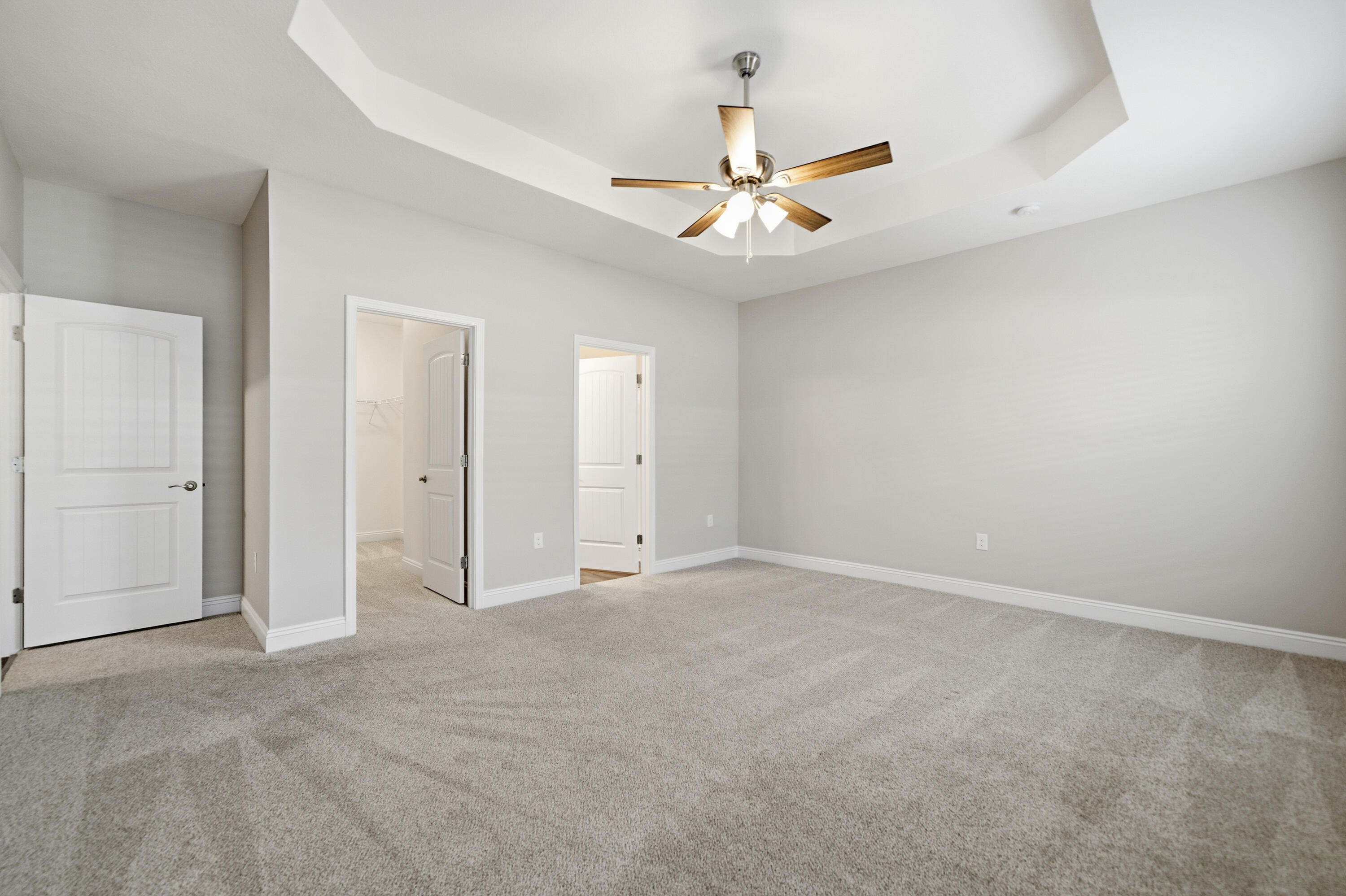 802 Marquis Way Freeport, FL 32439 - Photo 32 of 43 an empty room with a ceiling fan and a window