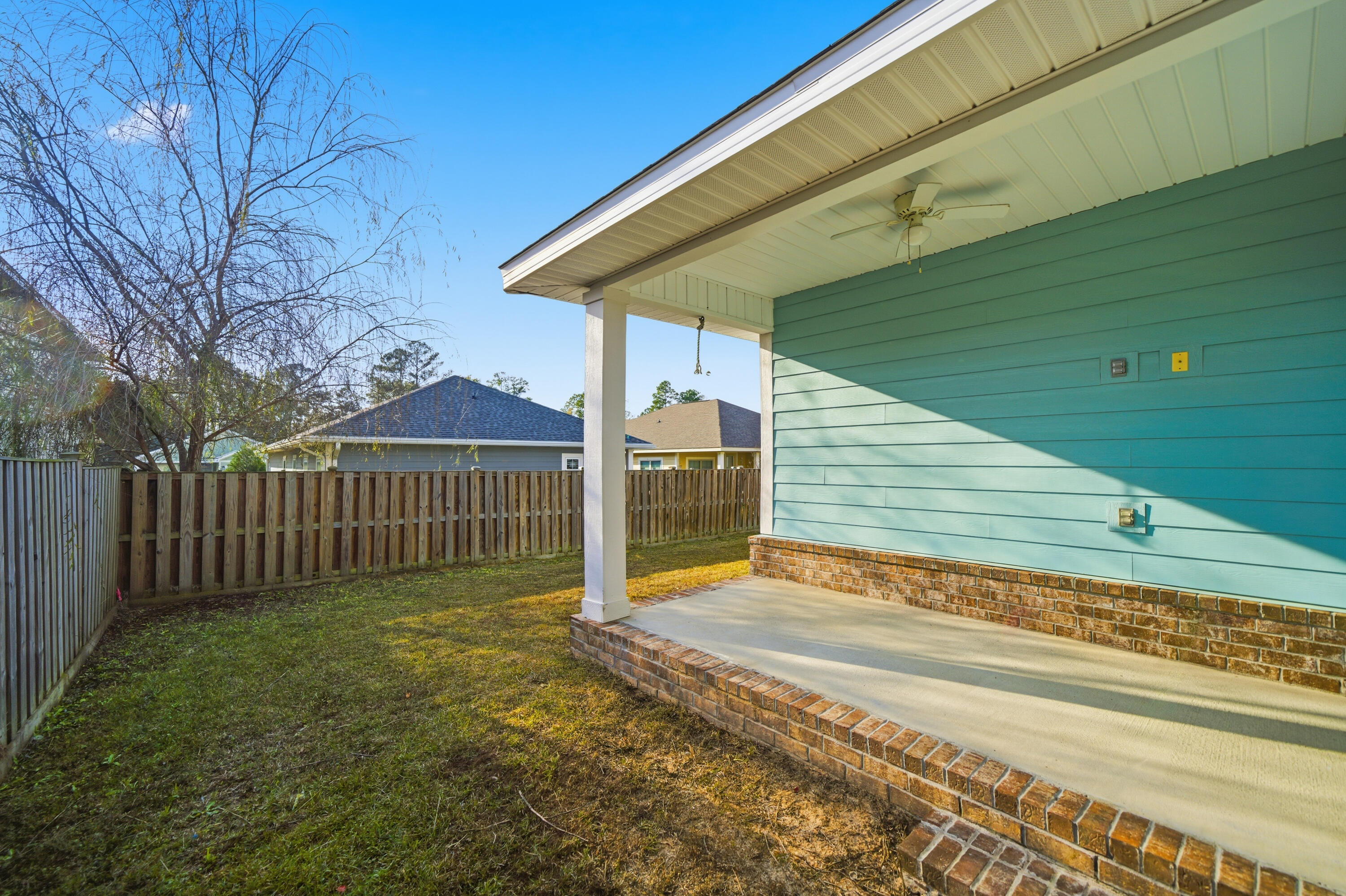 802 Marquis Way Freeport, FL 32439 - Photo 35 of 43 a view of a backyard
