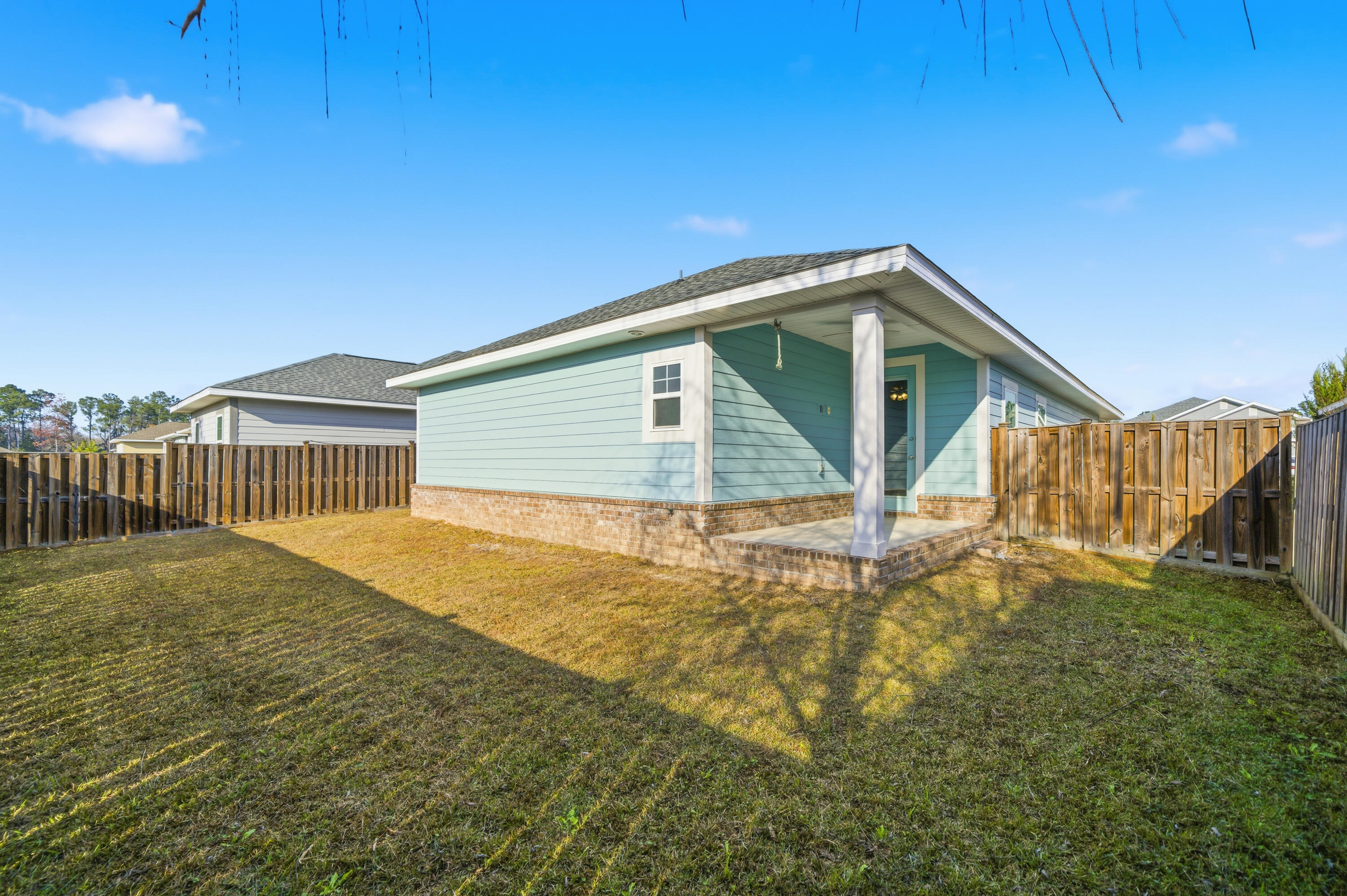 802 Marquis Way Freeport, FL 32439 - Photo 36 of 43 a house view with a garden space