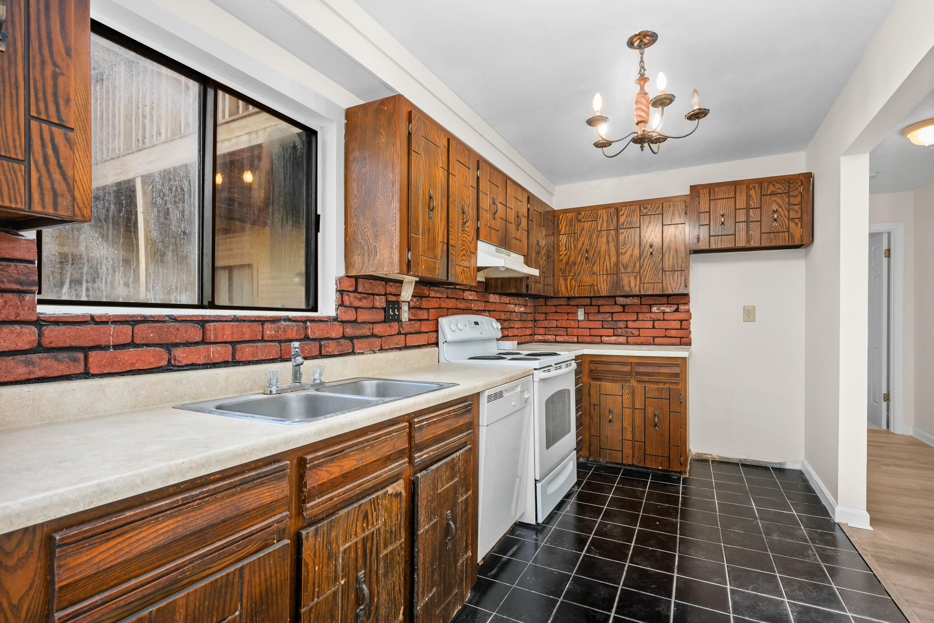 800 Bearses Way, Unit 2NB Hyannis, MA 02601 - Photo 11 of 20 a kitchen with sink cabinets and appliances