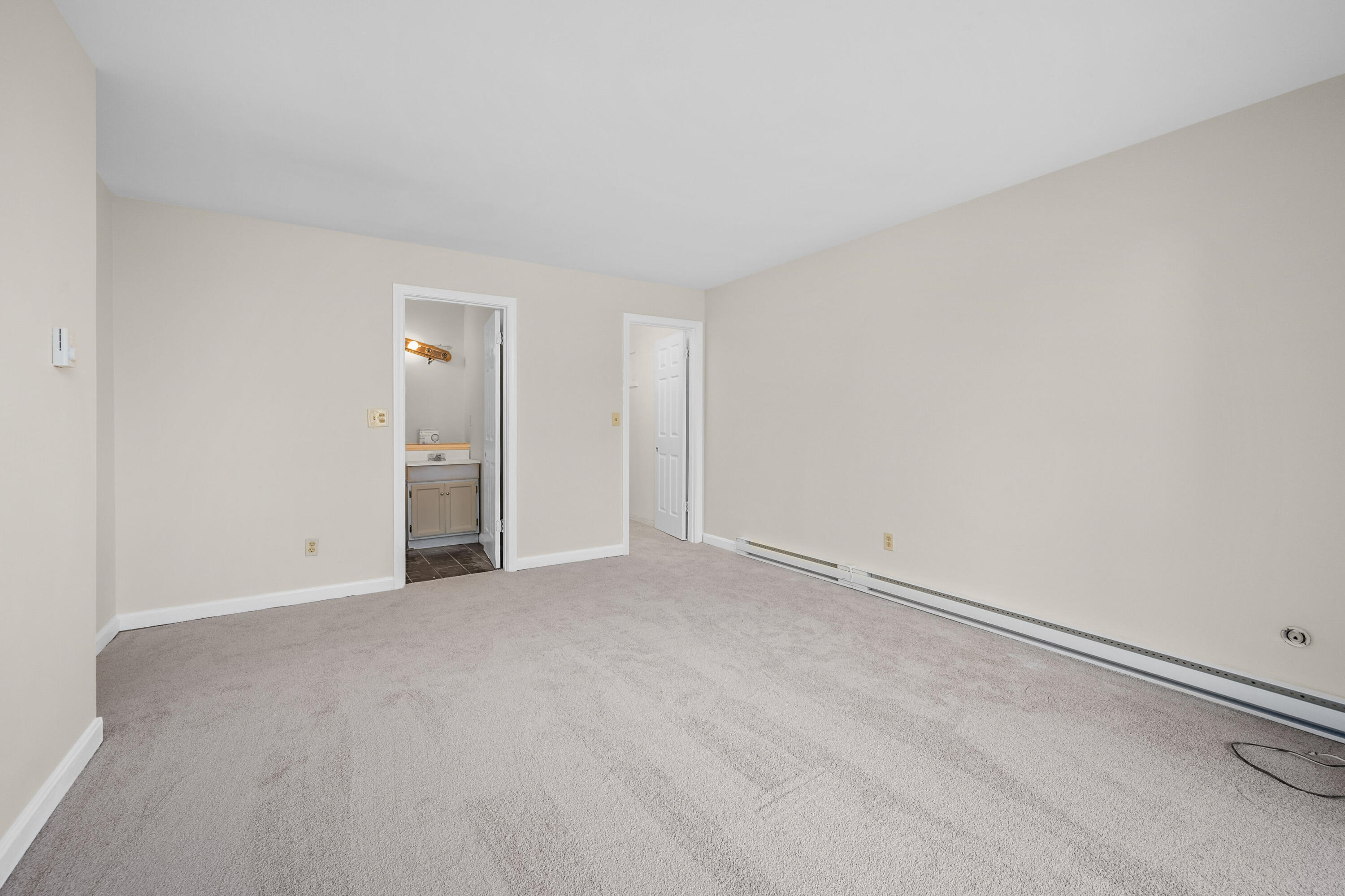800 Bearses Way, Unit 2NB Hyannis, MA 02601 - Photo 13 of 20 an empty room with an entryway