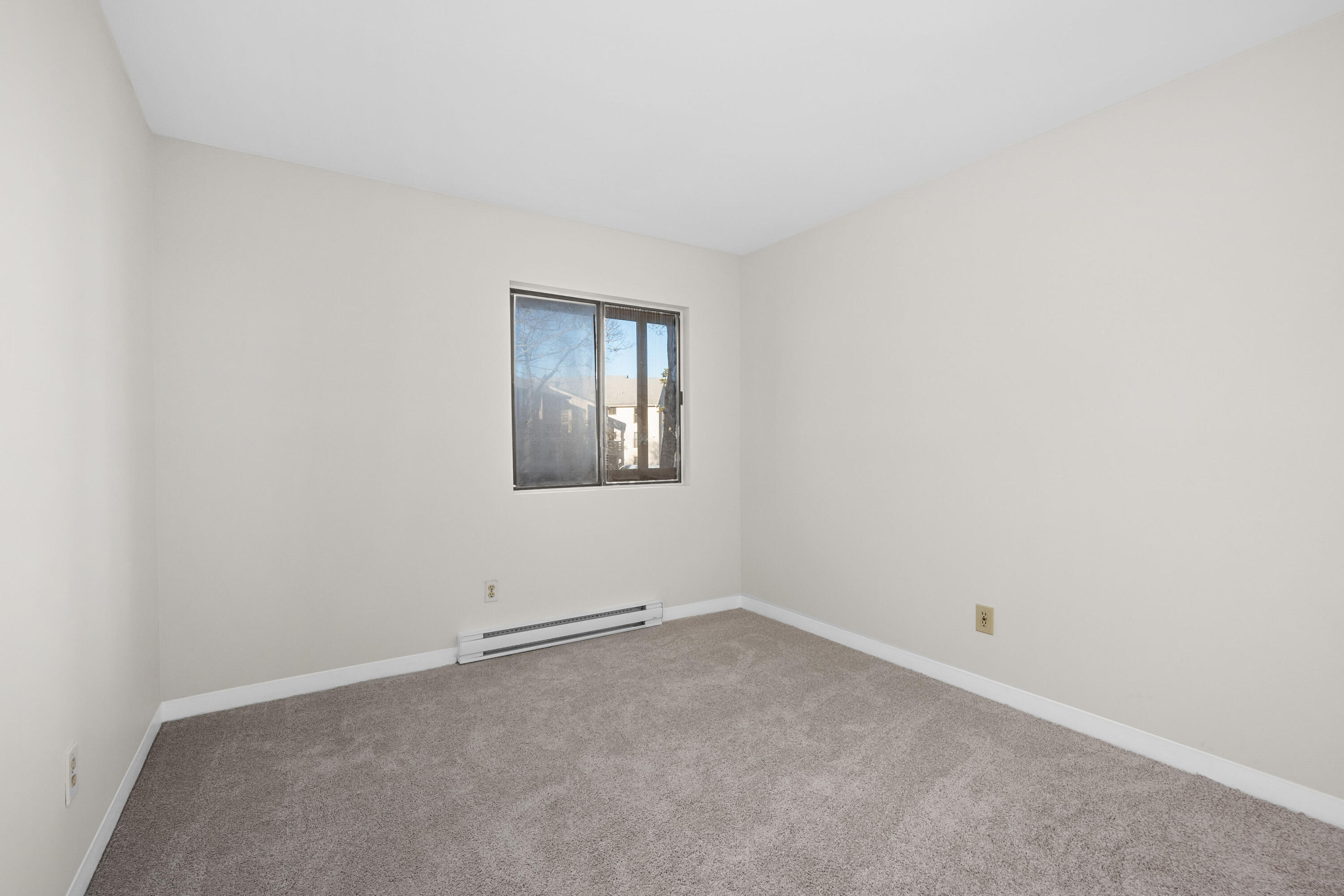 800 Bearses Way, Unit 2NB Hyannis, MA 02601 - Photo 16 of 20 an empty room with a window