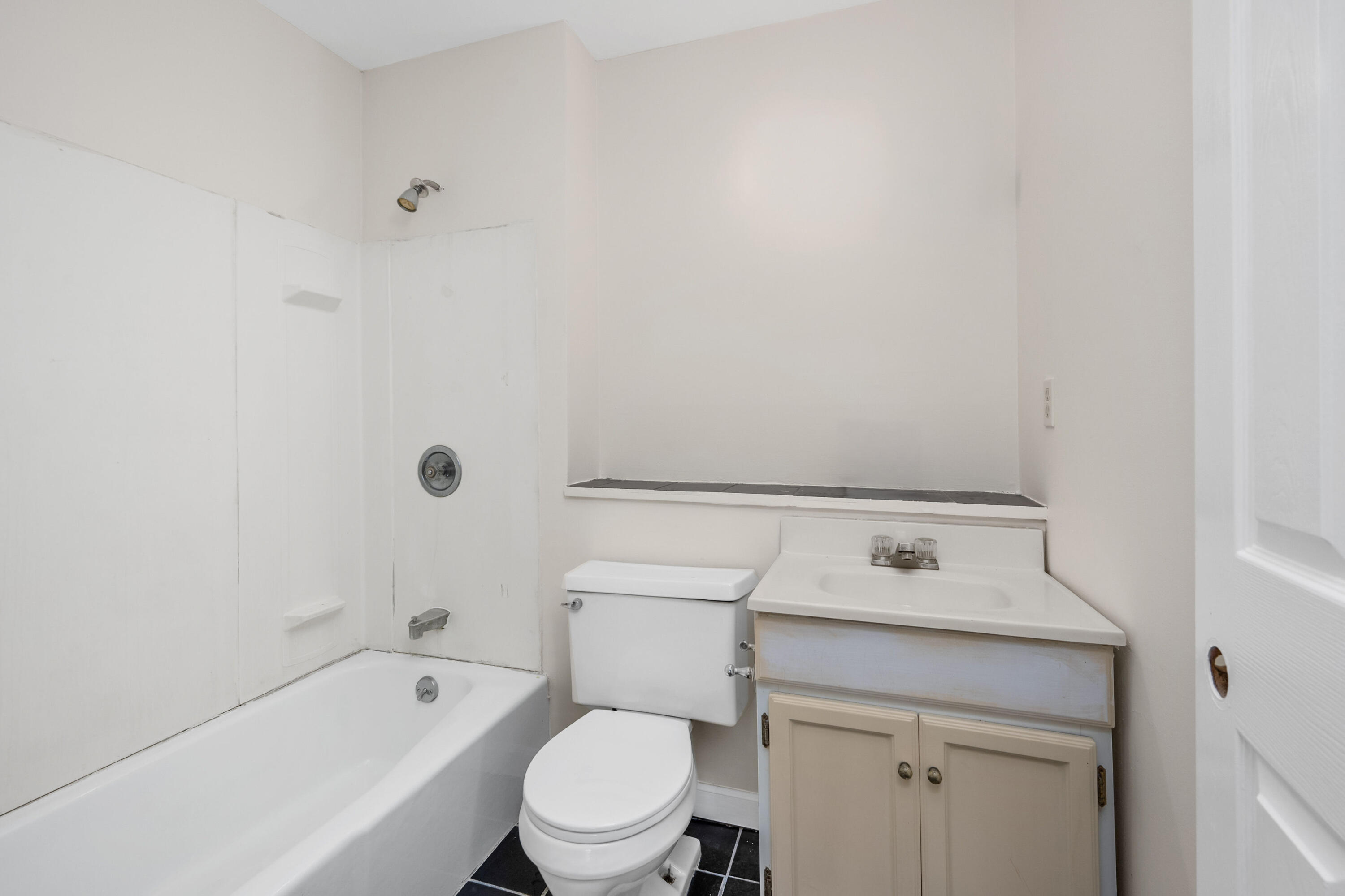 800 Bearses Way, Unit 2NB Hyannis, MA 02601 - Photo 20 of 20 a view of a bathroom with a sink and a toilet