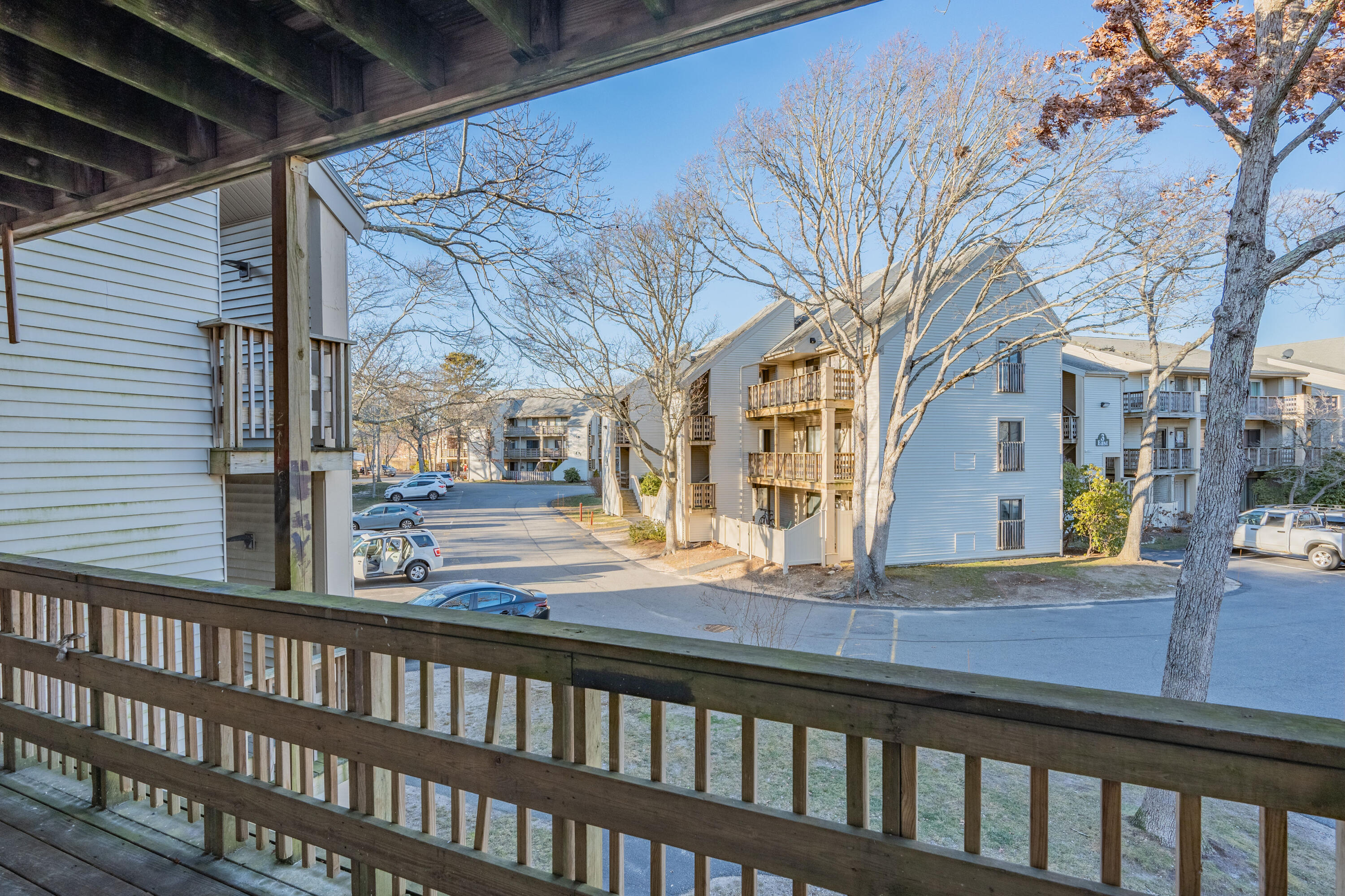 800 Bearses Way, Unit 2NB Hyannis, MA 02601 - Photo 3 of 20 a view of a brick building from a balcony