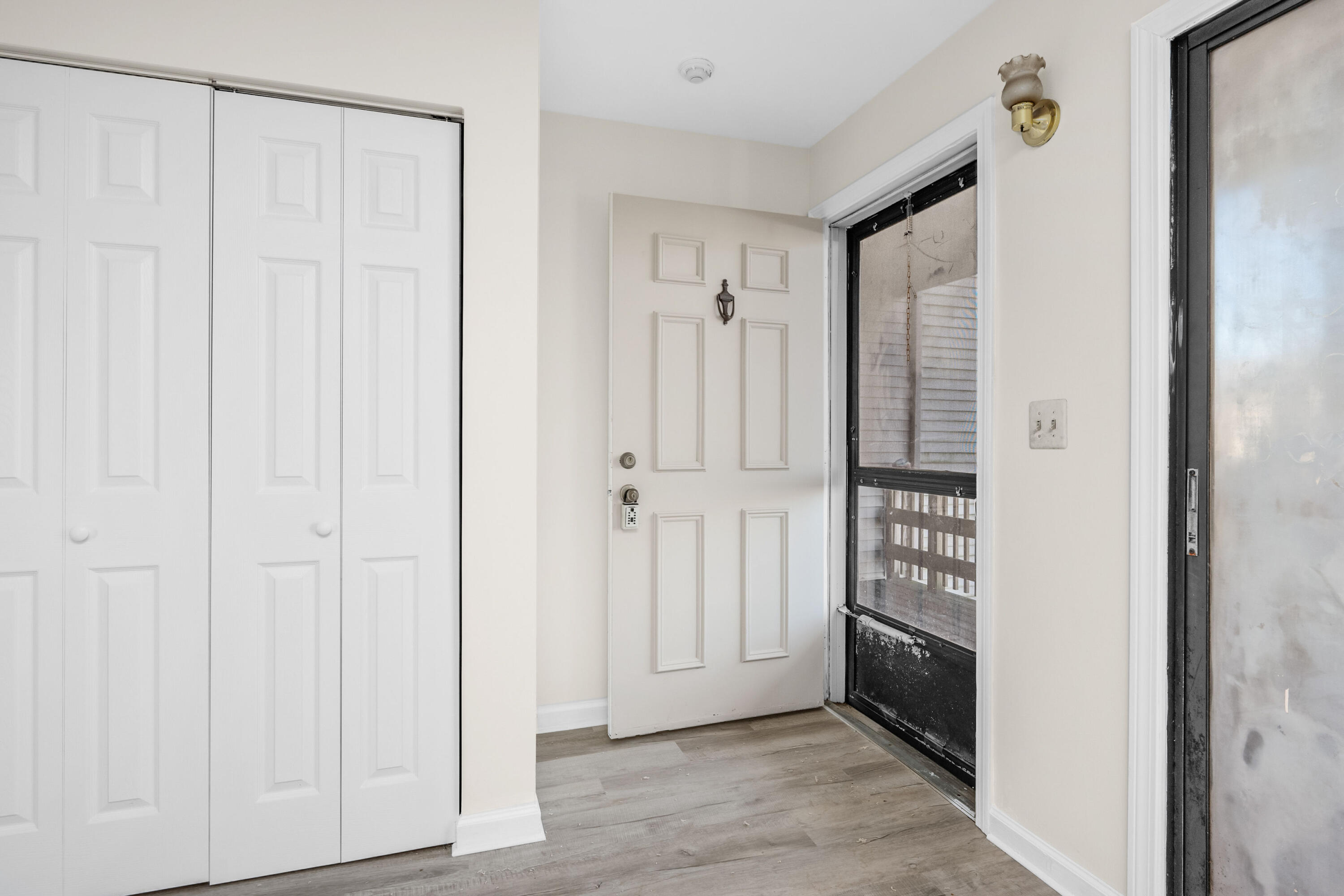 800 Bearses Way, Unit 2NB Hyannis, MA 02601 - Photo 5 of 20 a view of a closet area with en suite bathroom