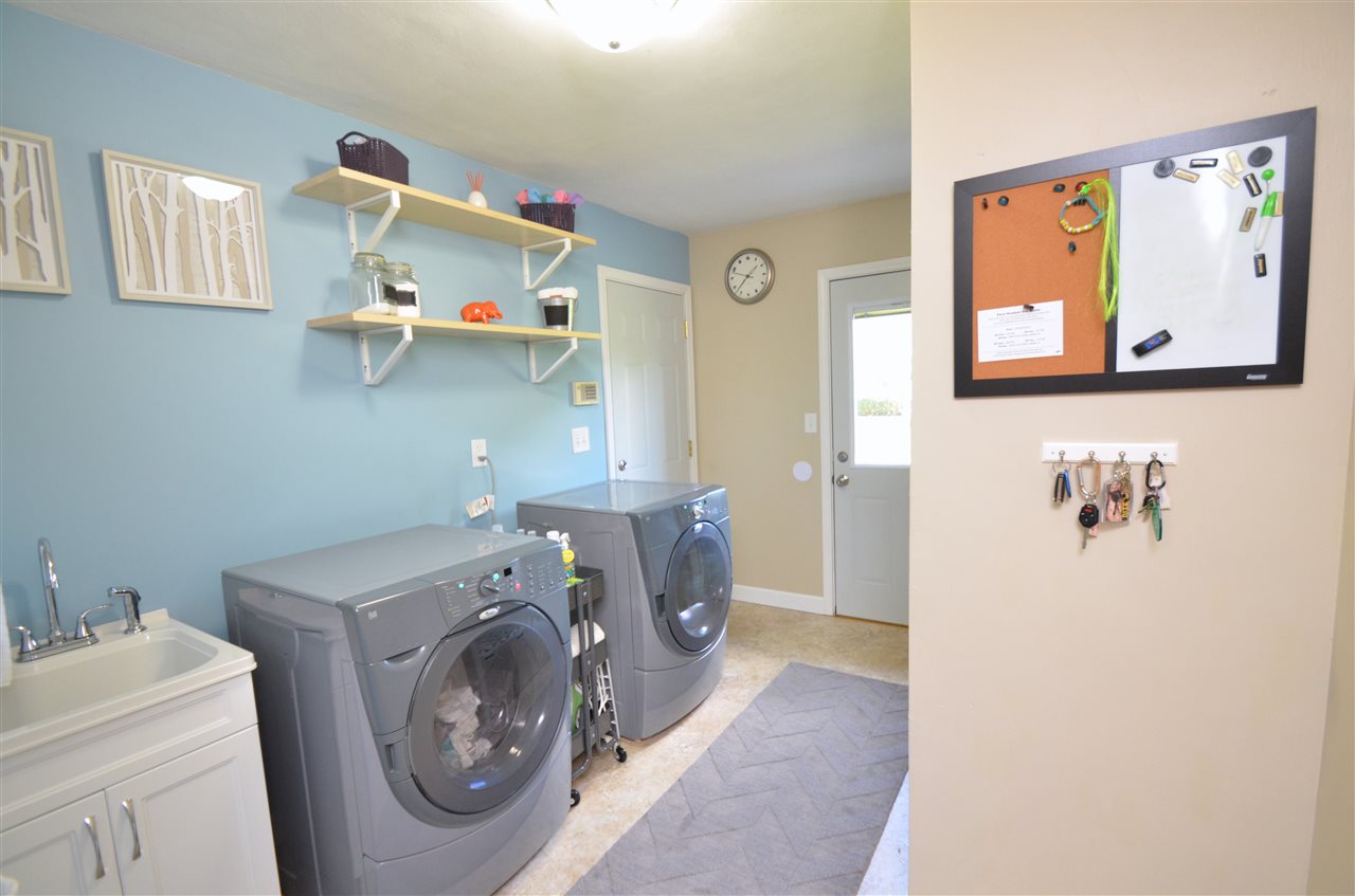 3942 Valerie Road Roscoe, IL 61073 - Photo 18 of 25 a utility room with dryer and washer