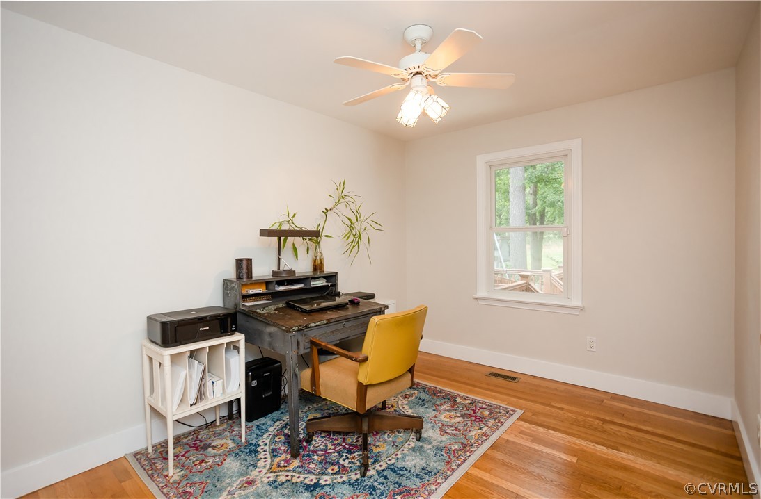 3160 Mountclair Road Chester, VA 23831 - Photo 25 of 50 a workspace room with furniture and wooden floor
