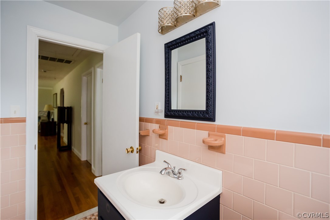 3160 Mountclair Road Chester, VA 23831 - Photo 32 of 50 a bathroom with a sink a mirror and a shower