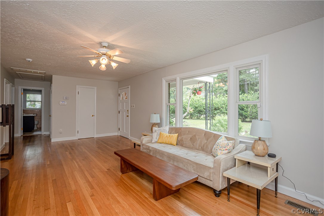 3160 Mountclair Road Chester, VA 23831 - Photo 4 of 50 a living room with furniture and a large window