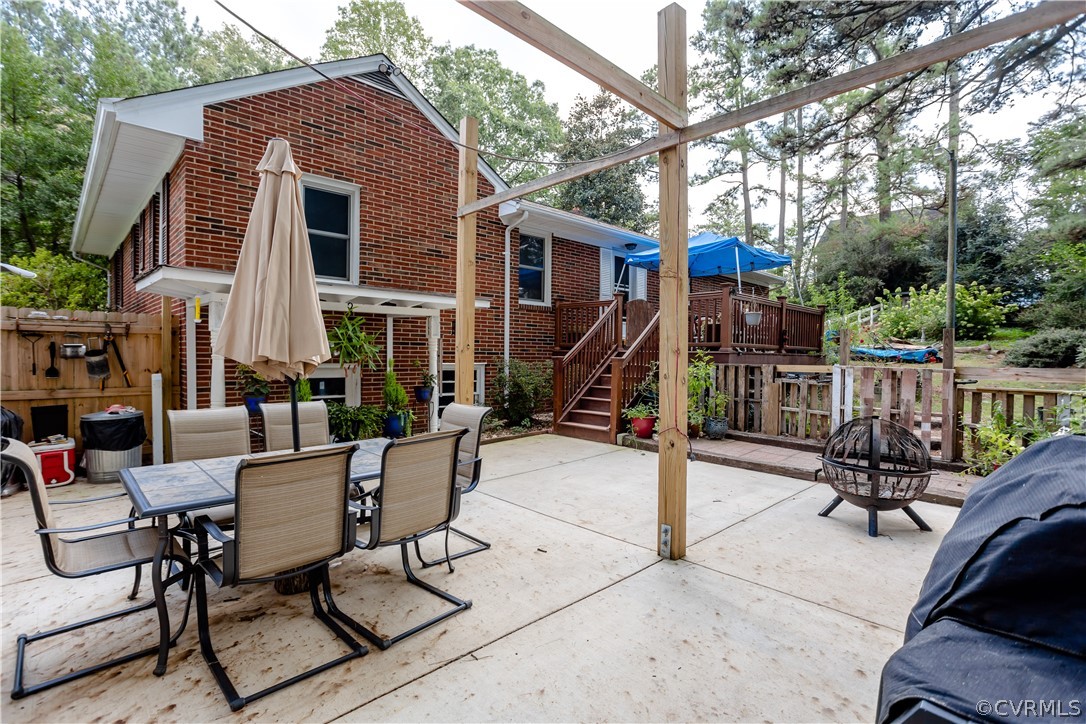 3160 Mountclair Road Chester, VA 23831 - Photo 41 of 50 a view of a patio with a table and chairs